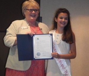 Highland Village Mayor Charlotte Wilcox honors baton twirling champion Chailie Alsaffar (Photo Courtesy: Amy Alsaffar).