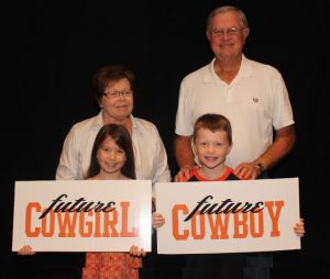  Connie and Jim Stiegler with two of their grand kids from Flower Mound (Photo Courtesy: OSU). 