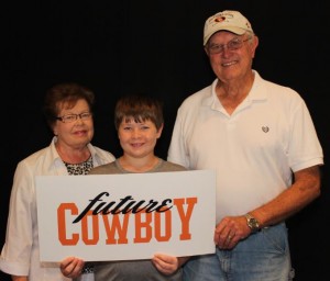 Connie and Jim Stiegler with one of their grandsons from Flower Mound (Photo Courtesy: OSU).