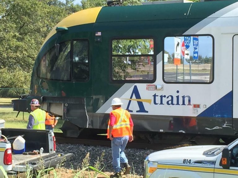 DCTA delays after train, truck collide; driver dead