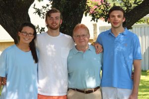 Bailey Beveridge, Joseph Clayton (second from left) and Matthew Clayton (right) worked to save Ron Clayton's life after he went into cardiac arrest while moving from Argyle to Dallas. 