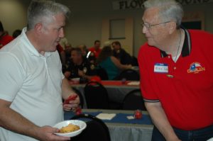 Flower Mound Fire Chief Eric Greaser chats with chaplain Mike Liles at a recent appreciation luncheon for first responders (Photo Courtesy: FMCC)