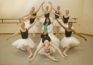 Winging their way through whimsy: School Director Kelly Kilburn-Lannin surrounded by Kristina Lorelli, Lauren Hunter, Chloe Davis, Carley Denton, Madeline Nanly, Julie Fenske, Julia Tiller and Carly Greene. (Photo by Helen’s Photography)