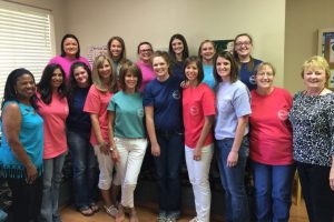 Lorraine Perry (left) and Kids First Pediatrics staff.