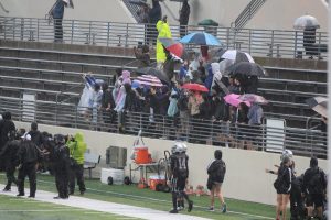 Fans brave the rain at Guyer's football game on Oct. 23.