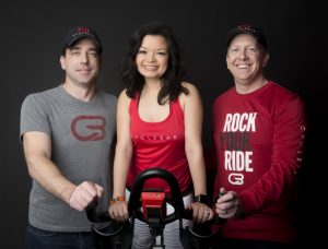 Cyclebar owners James Moller, Katherine Faubion, and Shelby Faubion.