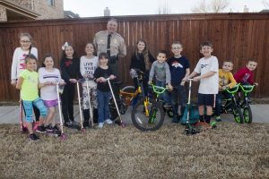 Sheriff Will Travis and Lantana children. (Photo by Helen's Photography)