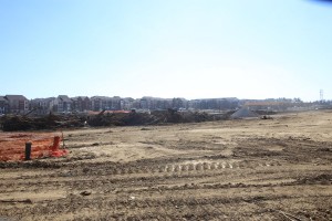 The southern view from the hotel site will overlook the future River Walk Amphitheatre, currently the tree depositary pictured. (Photo by Foust Photography)