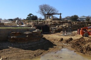 Recent dry days allowed final base-piers to be finished for construction on bridges and The Chapel island, to the left, with the waterfall behind. (Photo by Foust Photography)