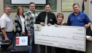 Copper Canyon Town Council members presented a $2,341 donation to Children’s Advocacy Center of Denton County Executive Director Dan Leal at their April meeting.