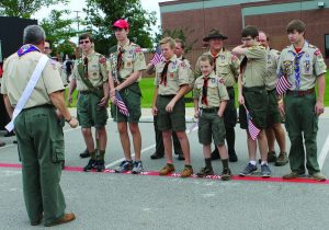 Members of Boy Scout Troop 451 who helped with Flower Mound’s inaugural Memorial Day event. Committee Chair Rob Rawson (second from right in back row) said, “We’re here to honor our fallen veterans.” Photo by Dru Murray.