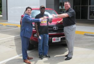 Rob Tharp, GM of Honda of Denton, Don Moody and Scott Fly, GM of Toyota of Denton.