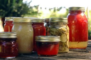 canning jars with various foods