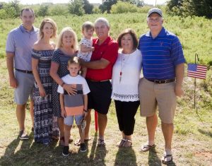 Aaron Hudson’s family members, couples left to right, at the ceremony: older sister Lezlie and Jonathan Ferrell, parents Annette and Mark Hudson with grandchildren Silas Aaron and Evelyn Ferrell and aunt and uncle Andrea and Jeff McKenzie. (Photo by Helen's Photographer)