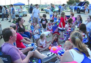 The Munsch, Stubbs, Cuzzo, Nackre, Brooks, and Higgins families enjoyed Flower Mound’s Independence Fest July 4, 2016, together. Photo by Dru Murray.