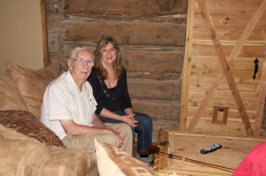 Wallace Lynch and daughter, Karyl Smith-log cabin WEB