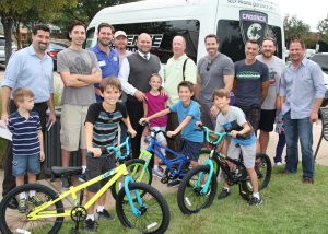 Lantana dads give back: Brett Moody, Kris Bryan, John Blaskovich, Jimmy Bridges, Rob Boles, Jason Shewmaker, Bob Schmalholz with Cadance Cyclery, Ryan Williams, Justin Snyder.