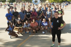 Amy Woody oversees 175 budding musicians as Guyer High School’s Band Director. (Photo by Helen’s Photography)