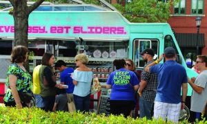 Everyone in this line wanted to savor a delicious slider with names like The Plain Jane, The Classic, The Sweet + Lowdown, The Roadside and The Nutty Pig. (Photo courtesy of Dru Murray)