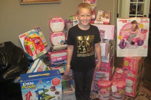 Sadie Keller, 9, is collecting Christmas presents for children just like her who are battling cancer. (Photo by Mark Miller)