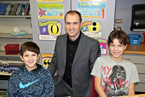 Bartonville Council Member Jim Murphy with students at Argyle Intermediate School.