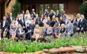 Russell Rhodes (front row, third from left) and The Rhodes Team have joined Berkshire Hathaway HomeServices PenFed Realty Texas. (Photo: Business Wire)