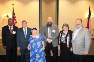 (Pictured left to right): Bill Lawrence, Congressman Michael Burgess, Robera DuTeil, Clinton Turner, Ginger Simonson, Chuck Wright.