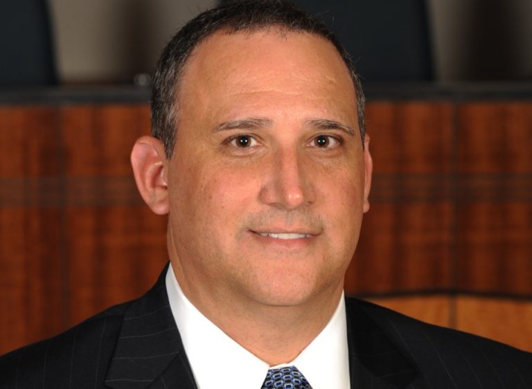 Lombardo files to keep seat