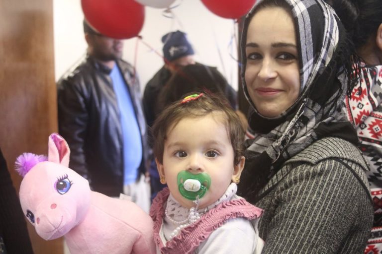Volunteers help refugees feel at home
