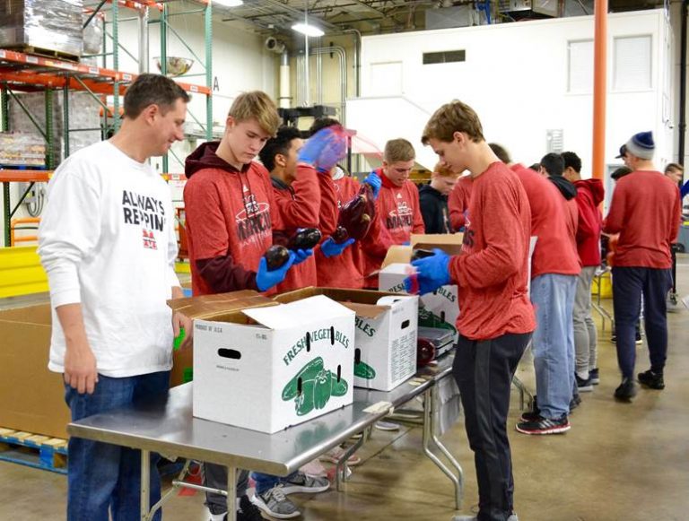 Marcus boys basketball program gives back at North Texas Food Bank