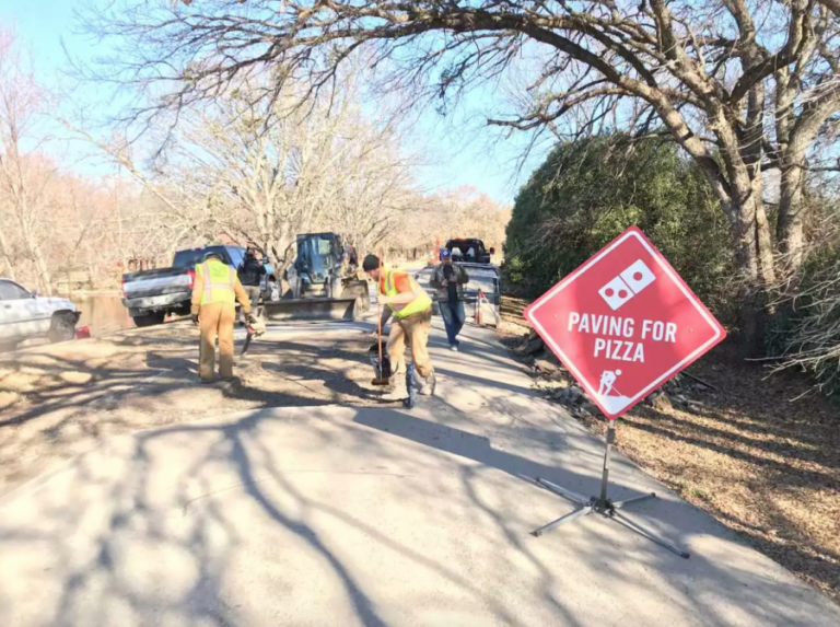 Domino’s repairs potholes in Bartonville in new ad campaign