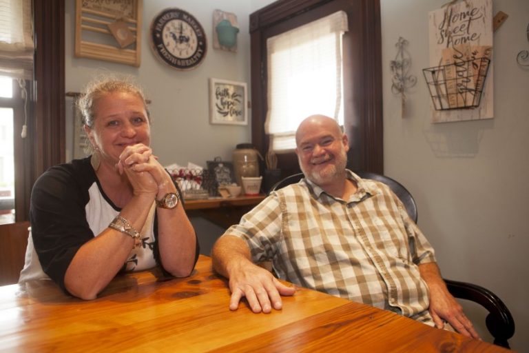 Farmhouse family planting roots in community