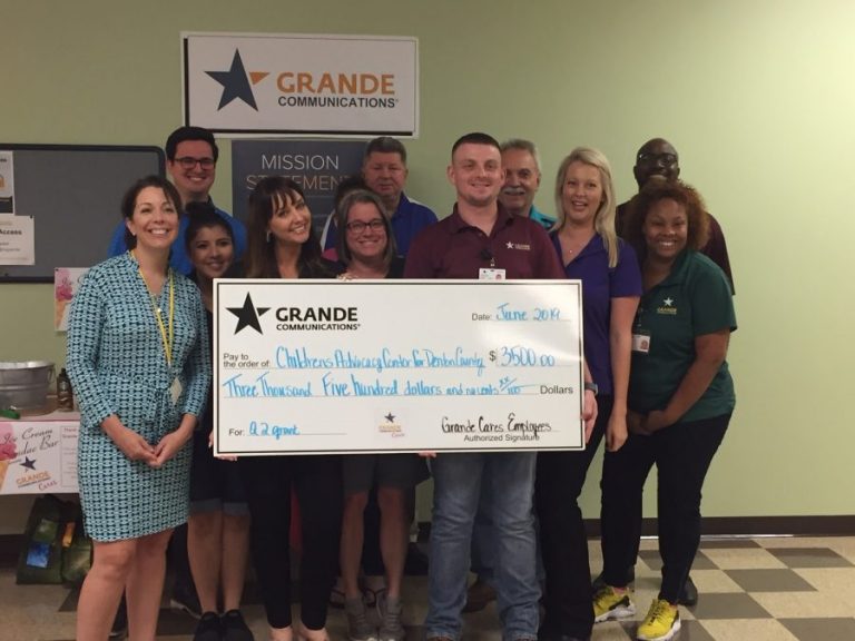 Grande Communications presents donation to local Children’s Advocacy Center