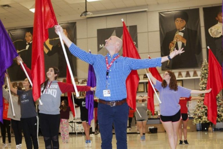 Everything’s coming up roses for color guard director