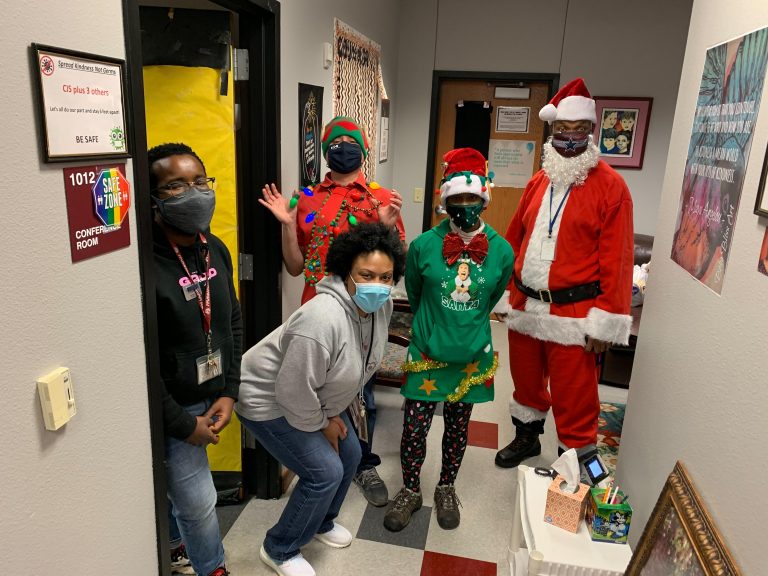 Local business, volunteers deliver Christmas gifts to LISD students