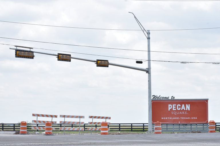 TxDOT installing traffic light at Harvest, Pecan Square