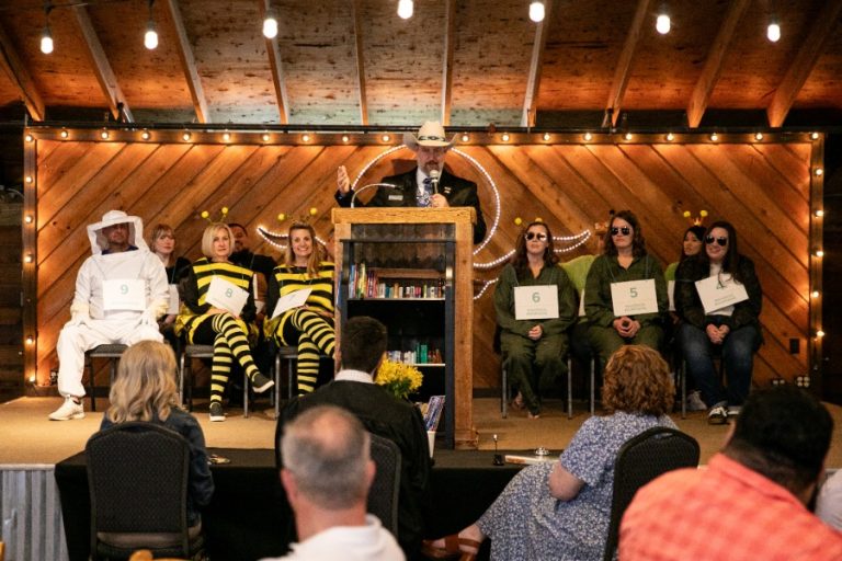 Local nonprofit Book Drive for Kids raises $35k from second annual adult spelling bee