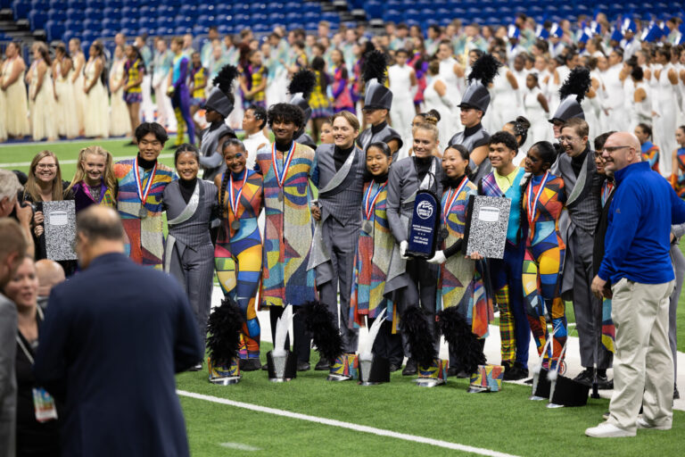 Local high school bands drum up historic success in marching postseason