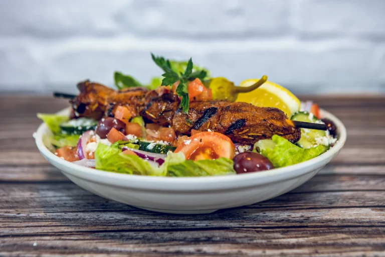 Lewisville Greek restaurant celebrates grand opening by donating to local food bank