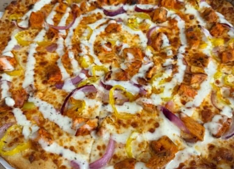 New Lewisville restaurant serves up pizza with a side of movies