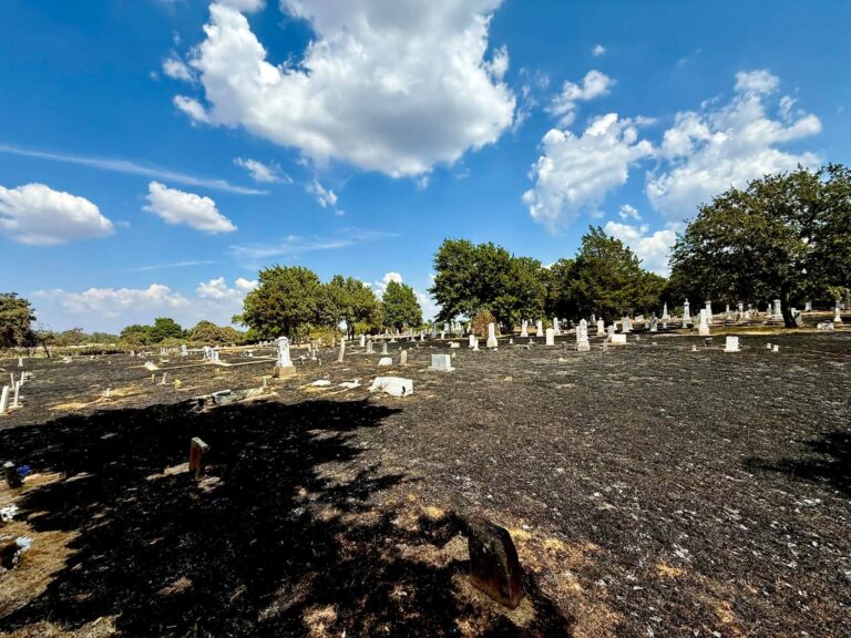 Grass fire burns parts of historic cemetery in Copper Canyon